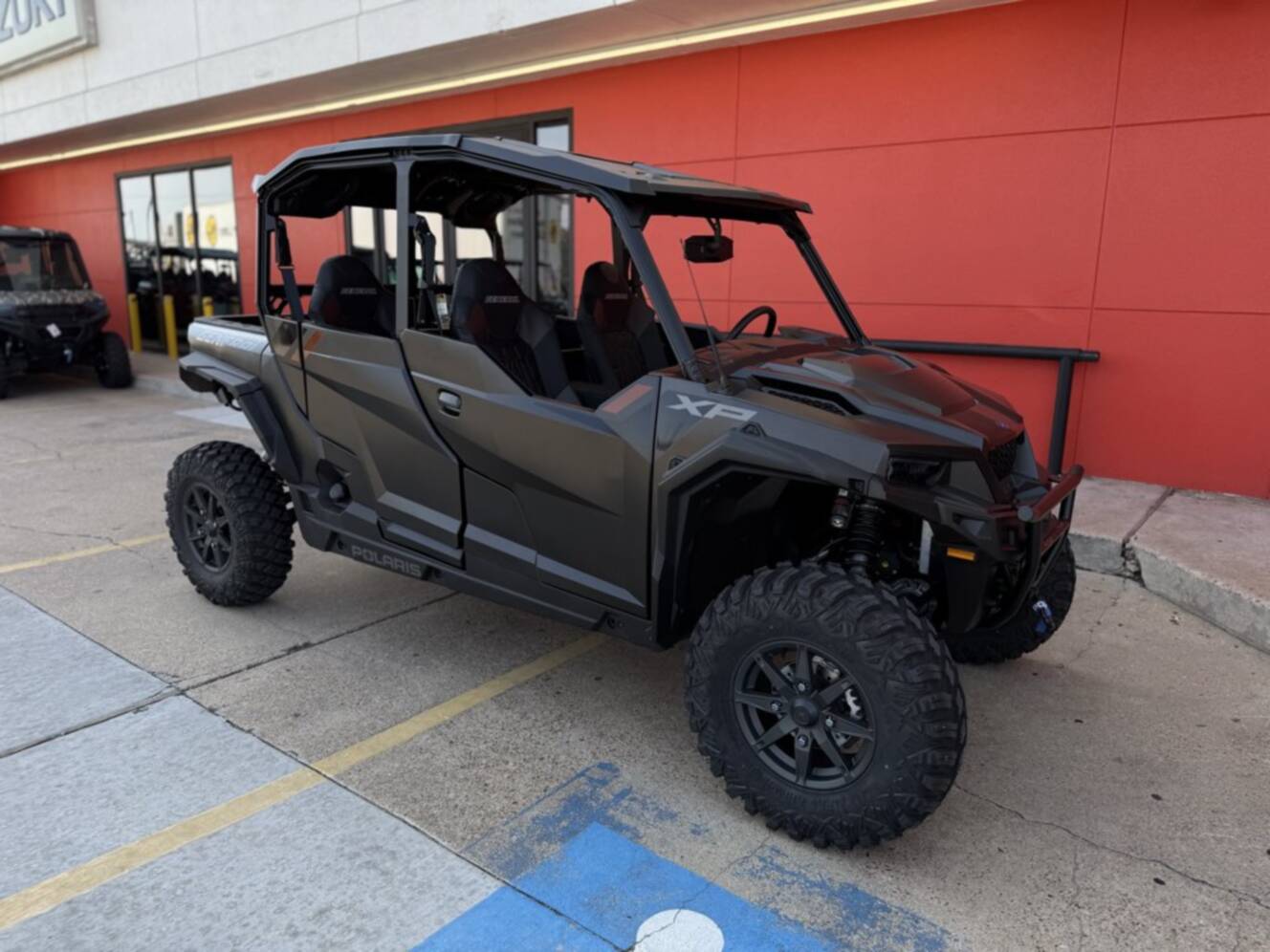 A photo of this 2026 Polaris GENERAL XP 4 1000 ULTIMATE SUPER GRAPHITE Ultimate