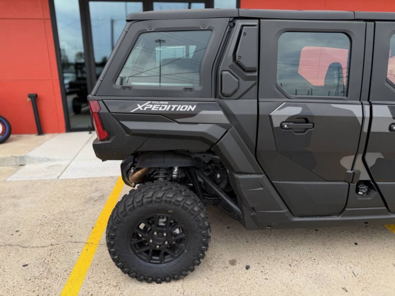 A photo of this 2026 Polaris XPEDITION ADV 5 NS MATTE SUPER GRAPHITE Northstar