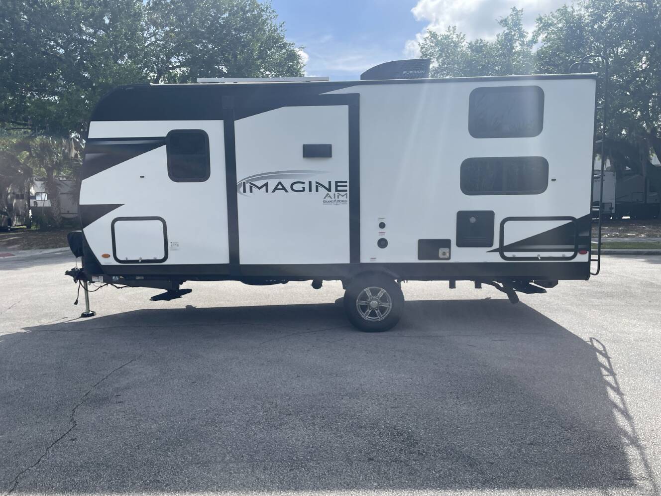 A photo of this 2023 Grand Design IMAGINE AIM 18BH