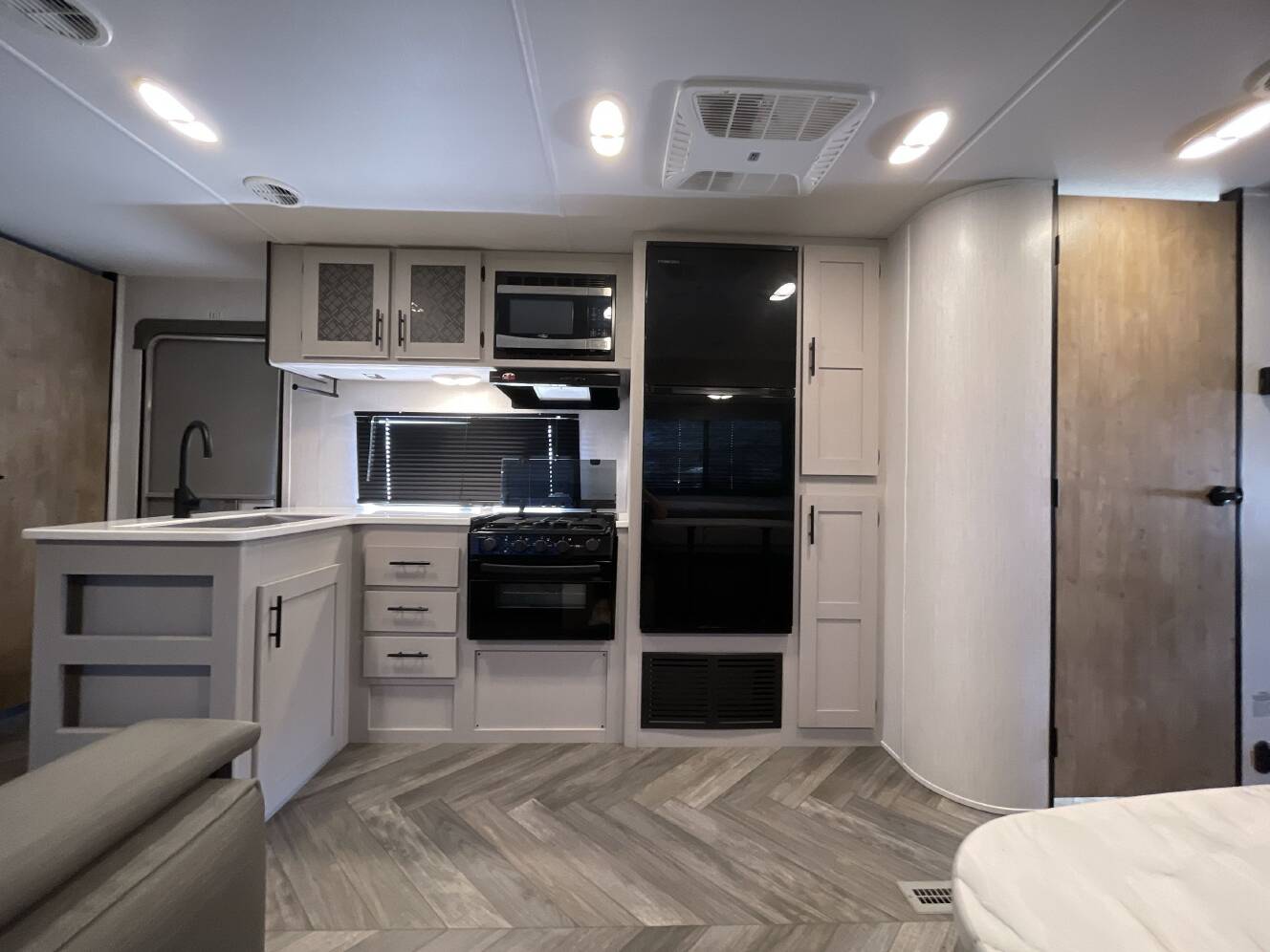 A photo of this 2023 Heartland PROWLER 303SBH
