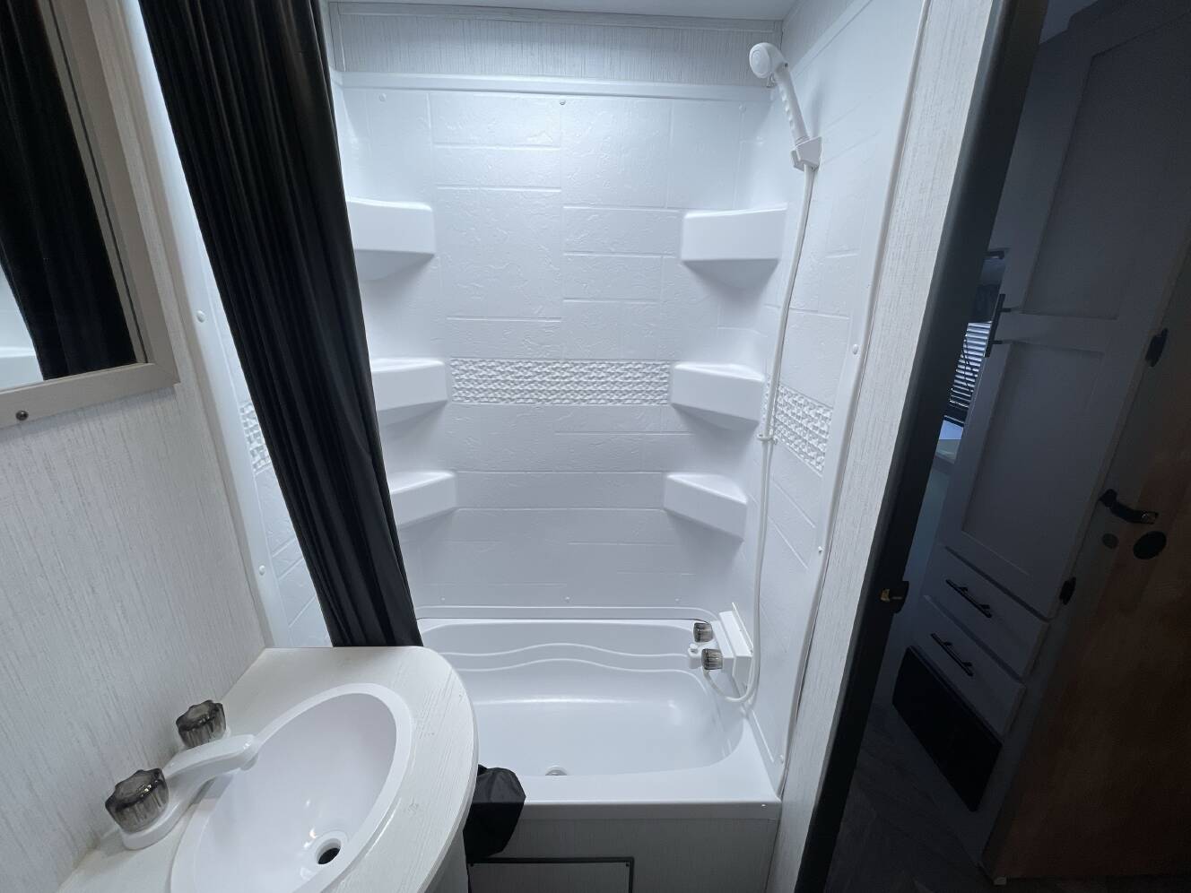 A photo of this 2023 Heartland PROWLER 303SBH