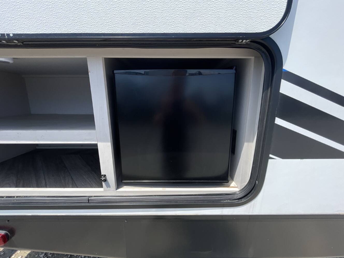 A photo of this 2023 Heartland PROWLER 303SBH