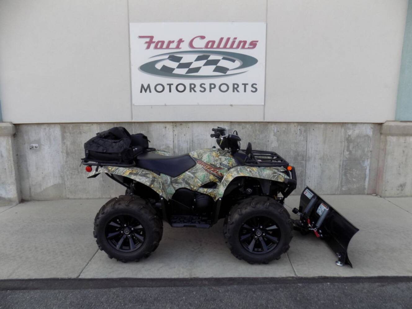 A photo of this 2024 Yamaha Grizzly EPS Camo