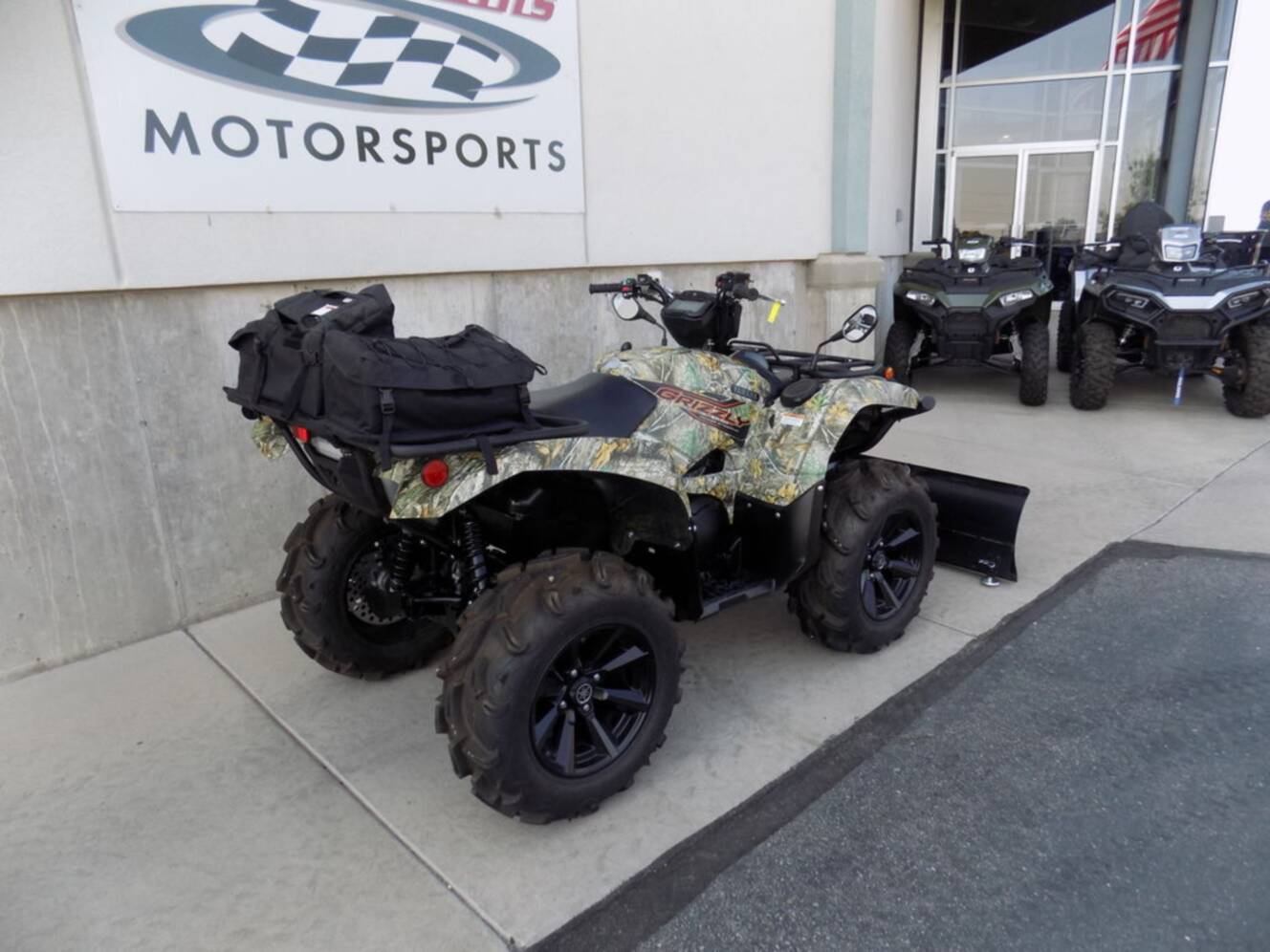 A photo of this 2024 Yamaha Grizzly EPS Camo