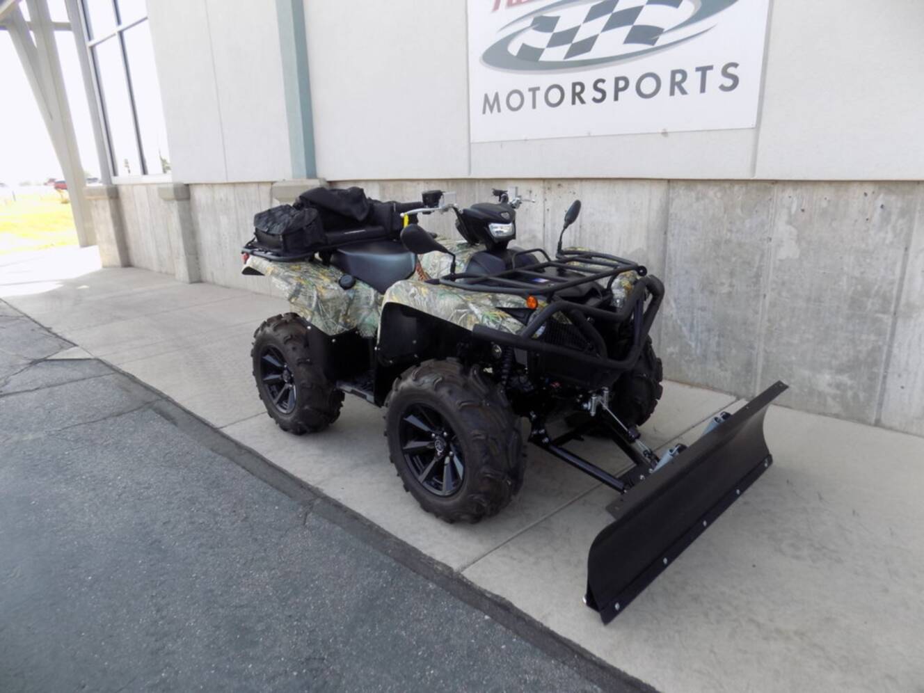 A photo of this 2024 Yamaha Grizzly EPS Camo
