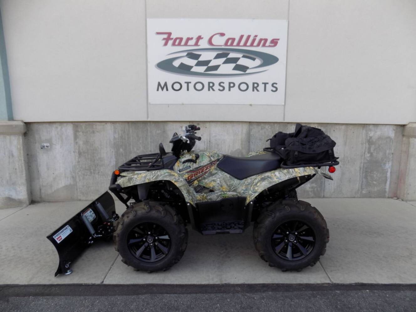 A photo of this 2024 Yamaha Grizzly EPS Camo