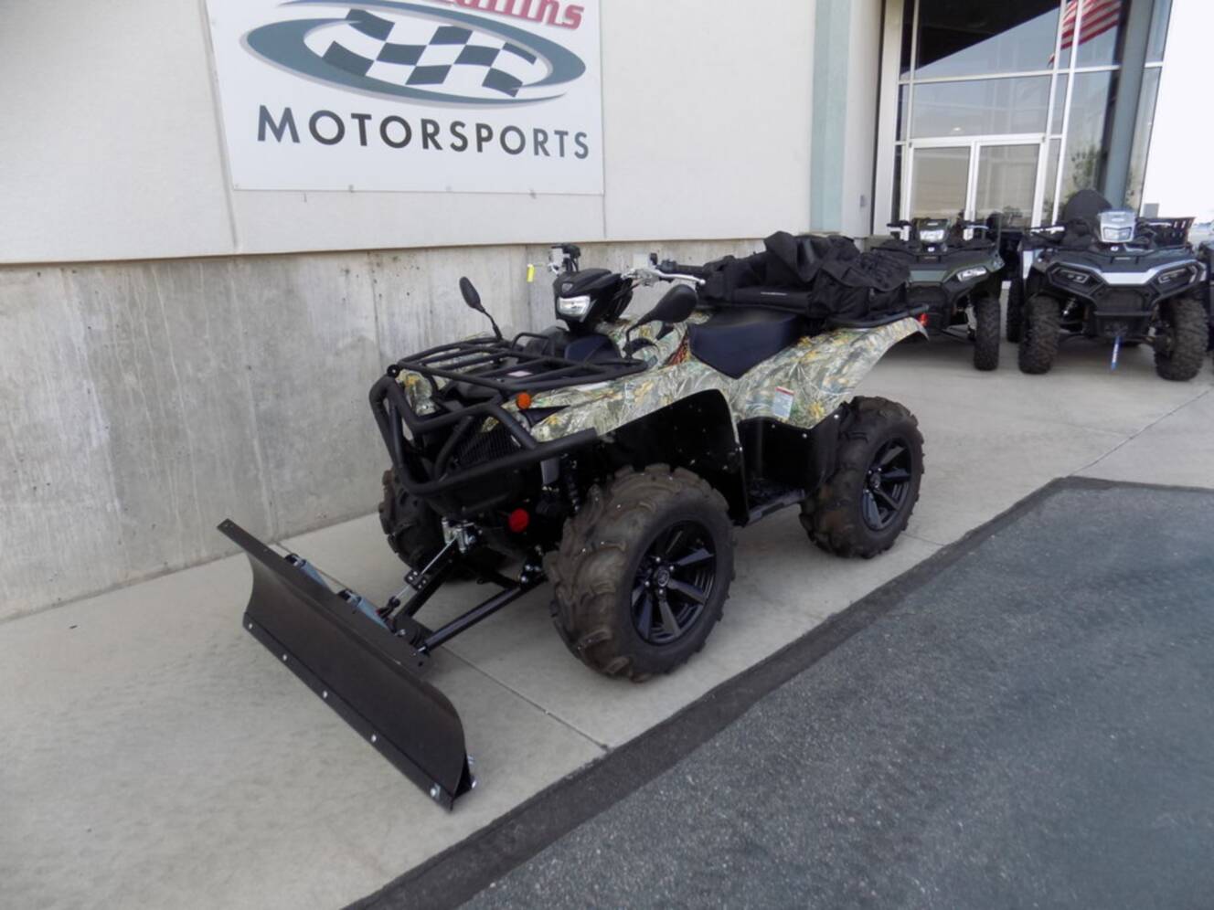 A photo of this 2024 Yamaha Grizzly EPS Camo