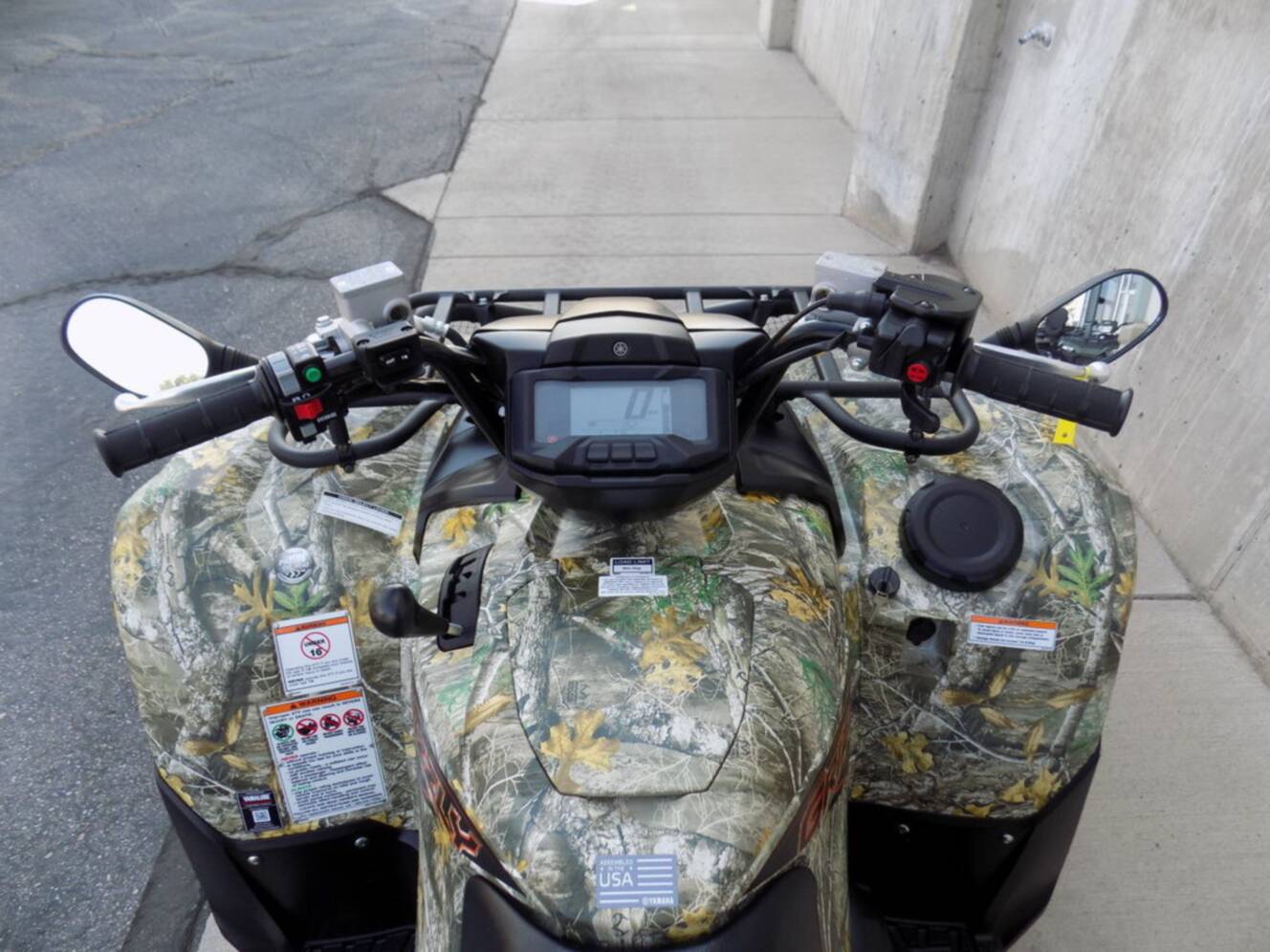 A photo of this 2024 Yamaha Grizzly EPS Camo