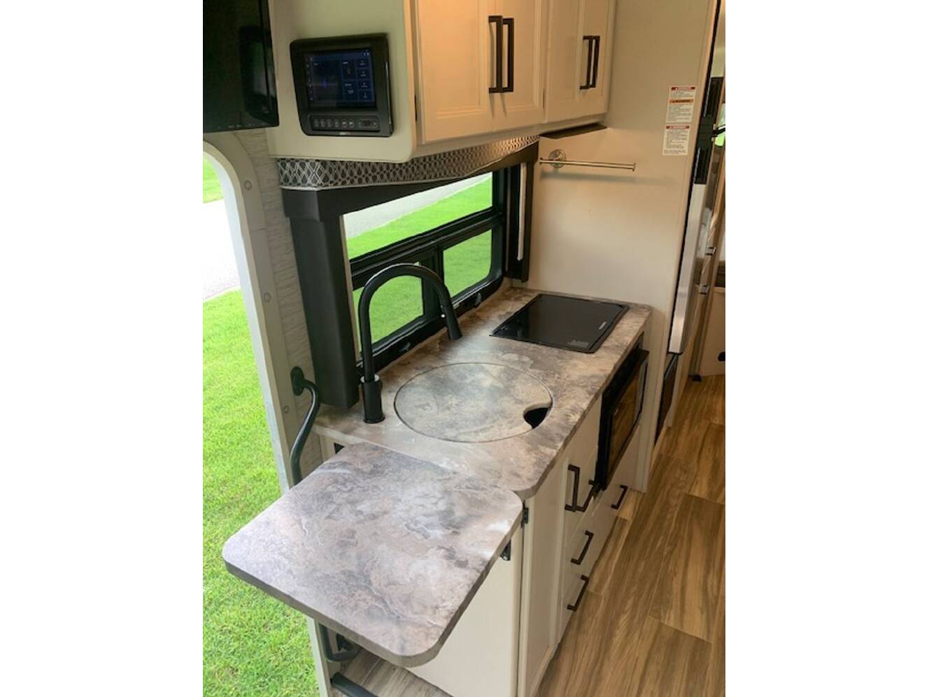 A photo of this 2021 Thor Motor Coach Axis 24.1