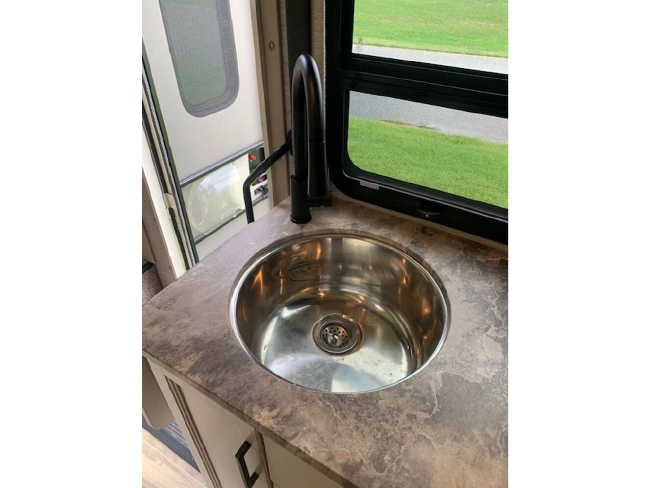 A photo of this 2021 Thor Motor Coach Axis 24.1