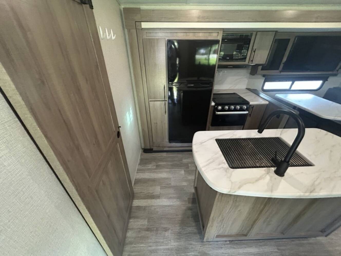 A photo of this 2023 Grand Design Imagine 3210BH
