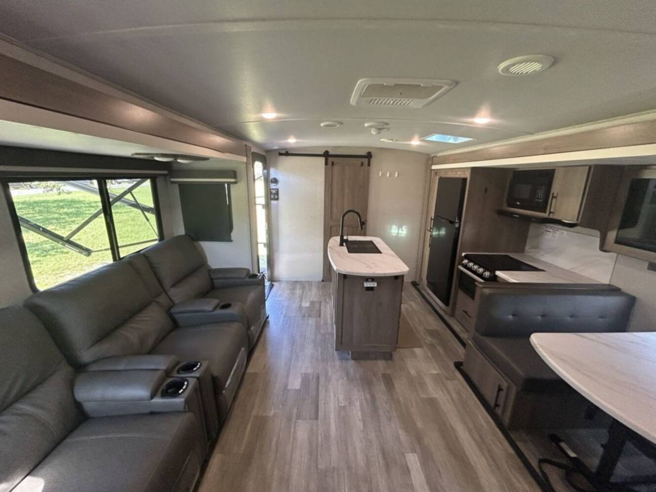 A photo of this 2023 Grand Design Imagine 3210BH