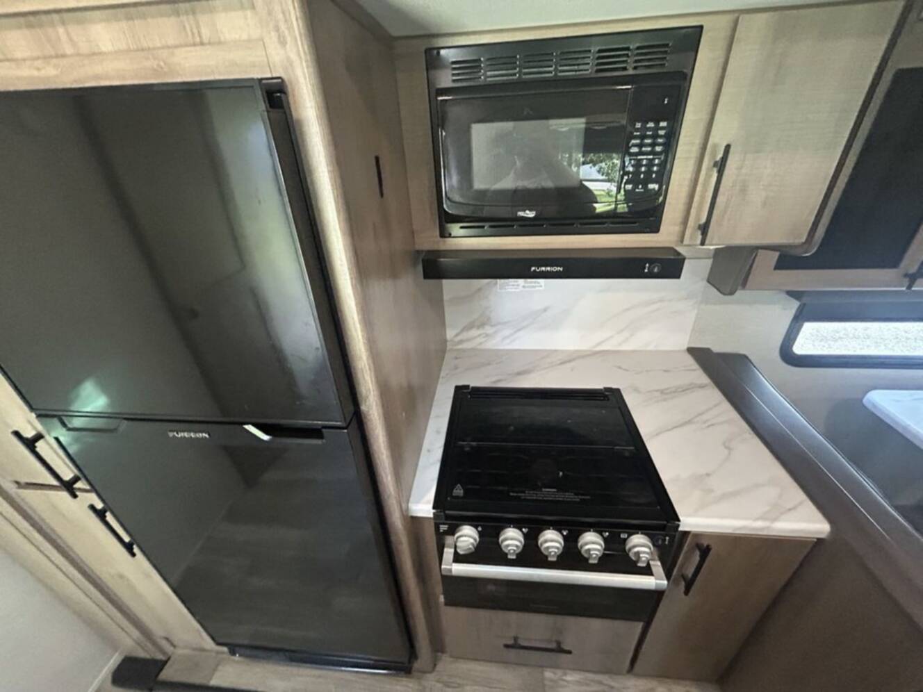 A photo of this 2023 Grand Design Imagine 3210BH