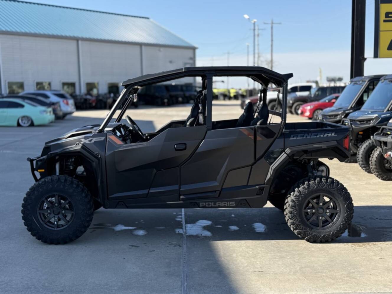 A photo of this 2026 Polaris GENERAL XP 4 1000 ULTIMATE SUPER GRAPHITE Ultimate