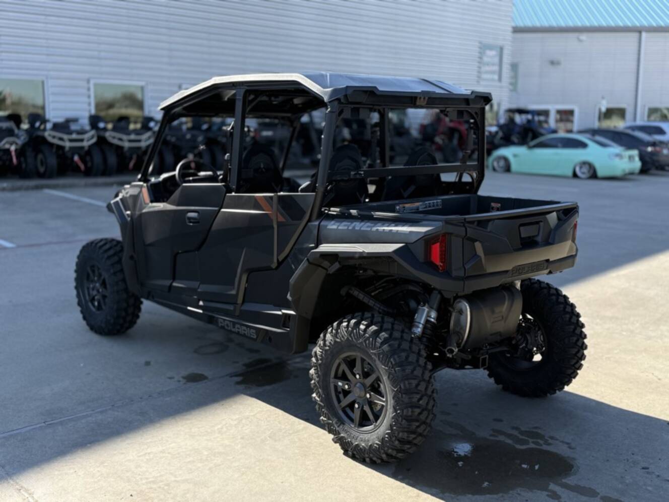 A photo of this 2026 Polaris GENERAL XP 4 1000 ULTIMATE SUPER GRAPHITE Ultimate