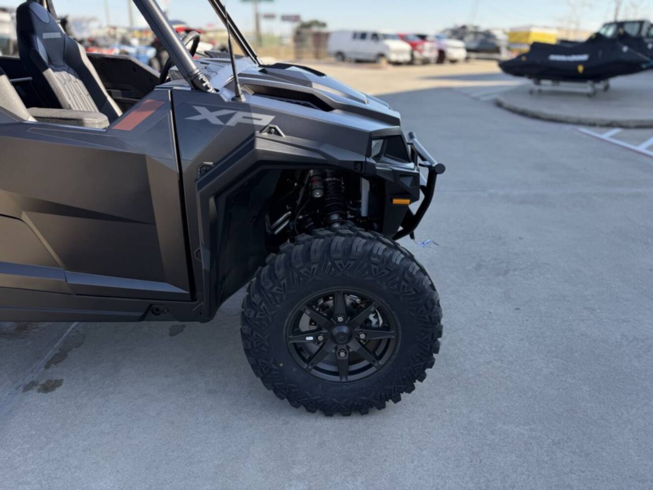 A photo of this 2026 Polaris GENERAL XP 4 1000 ULTIMATE SUPER GRAPHITE Ultimate