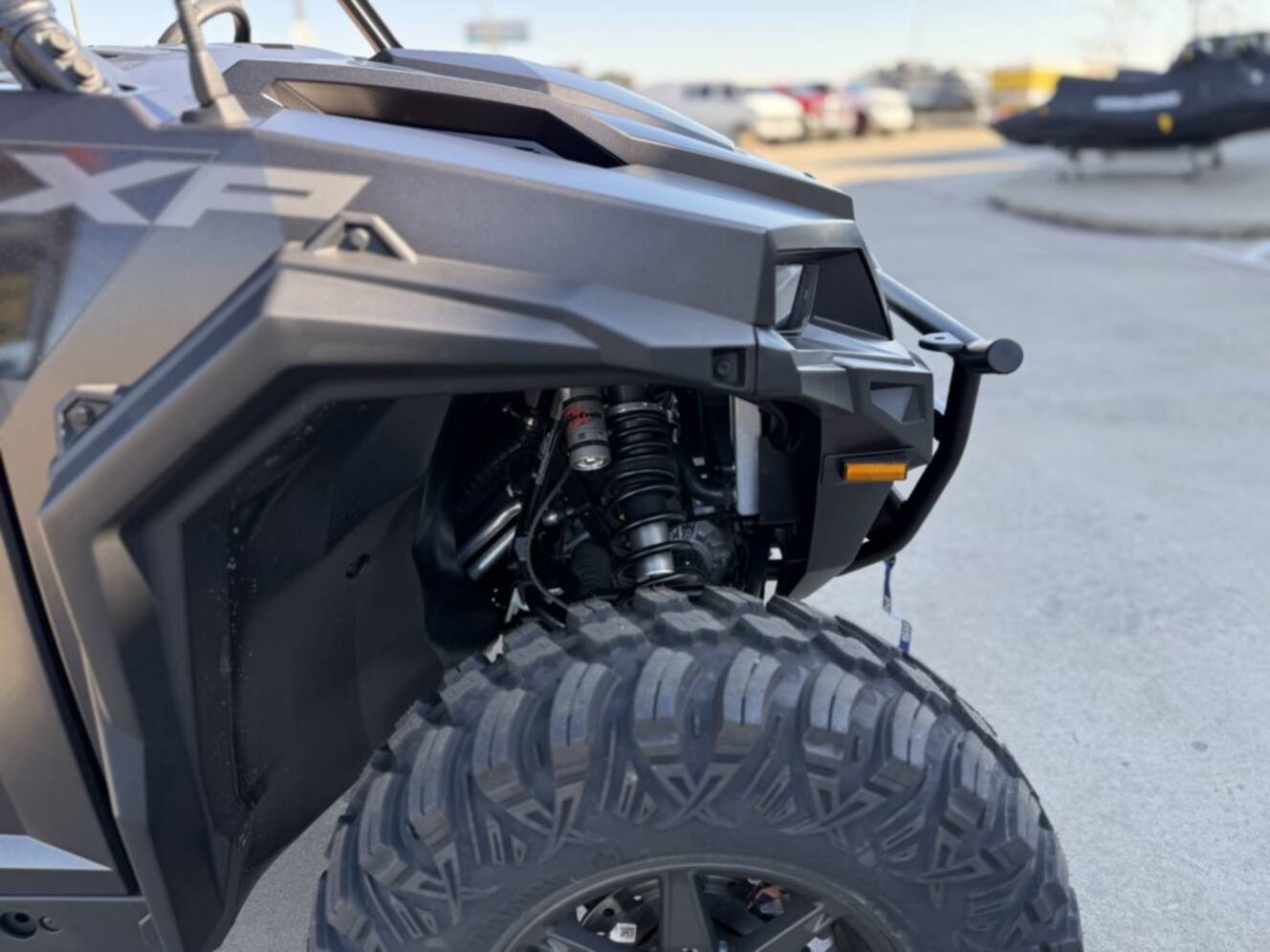 A photo of this 2026 Polaris GENERAL XP 4 1000 ULTIMATE SUPER GRAPHITE Ultimate