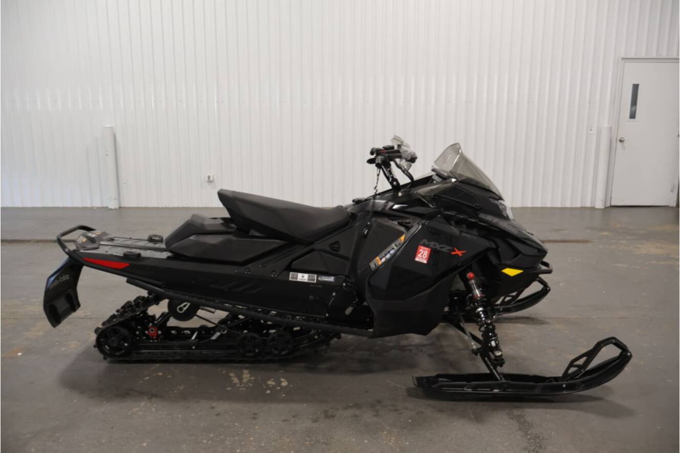 A photo of this 2026 Ski-Doo MXZ® X® 850 E-TEC 129 Ice Rip XT 1.25
