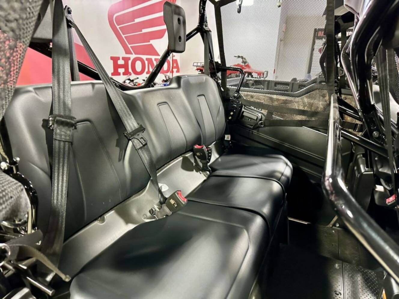 A photo of this 2025 Honda® Pioneer 1000-6 Deluxe Crew TrueTimber Atera Camo