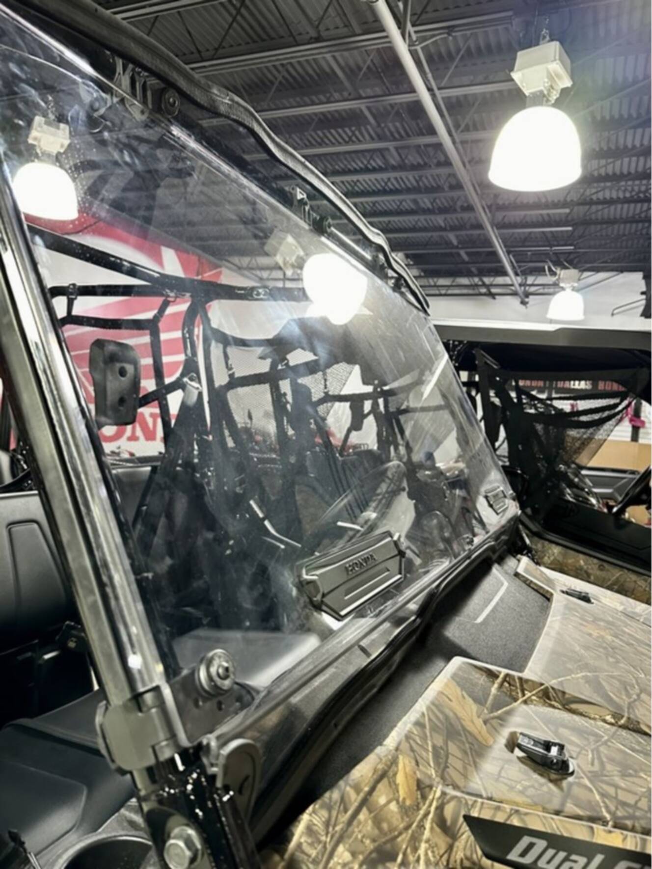 A photo of this 2025 Honda® Pioneer 1000-6 Deluxe Crew TrueTimber Atera Camo