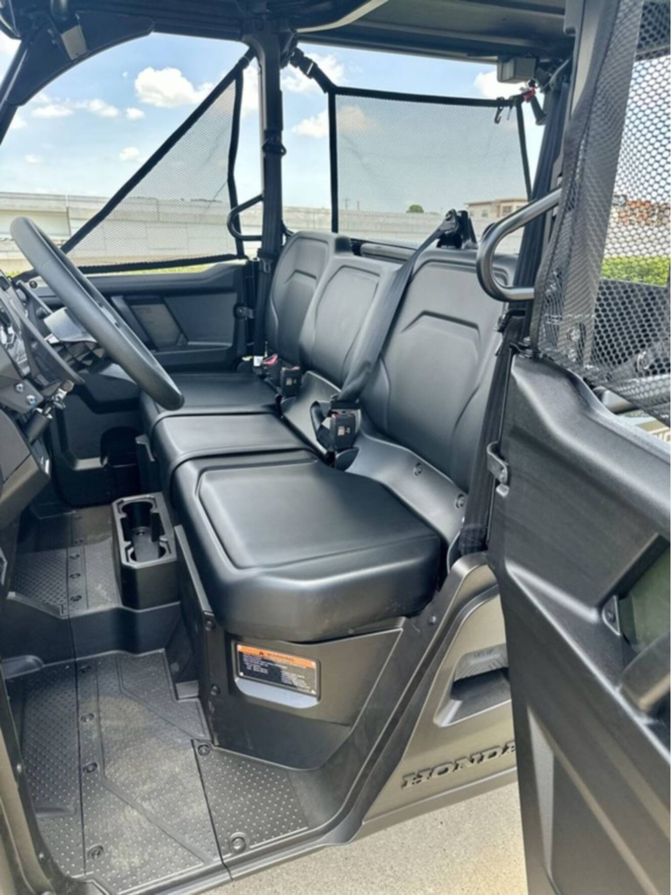 A photo of this 2026 Honda® Pioneer 1000-5 Deluxe