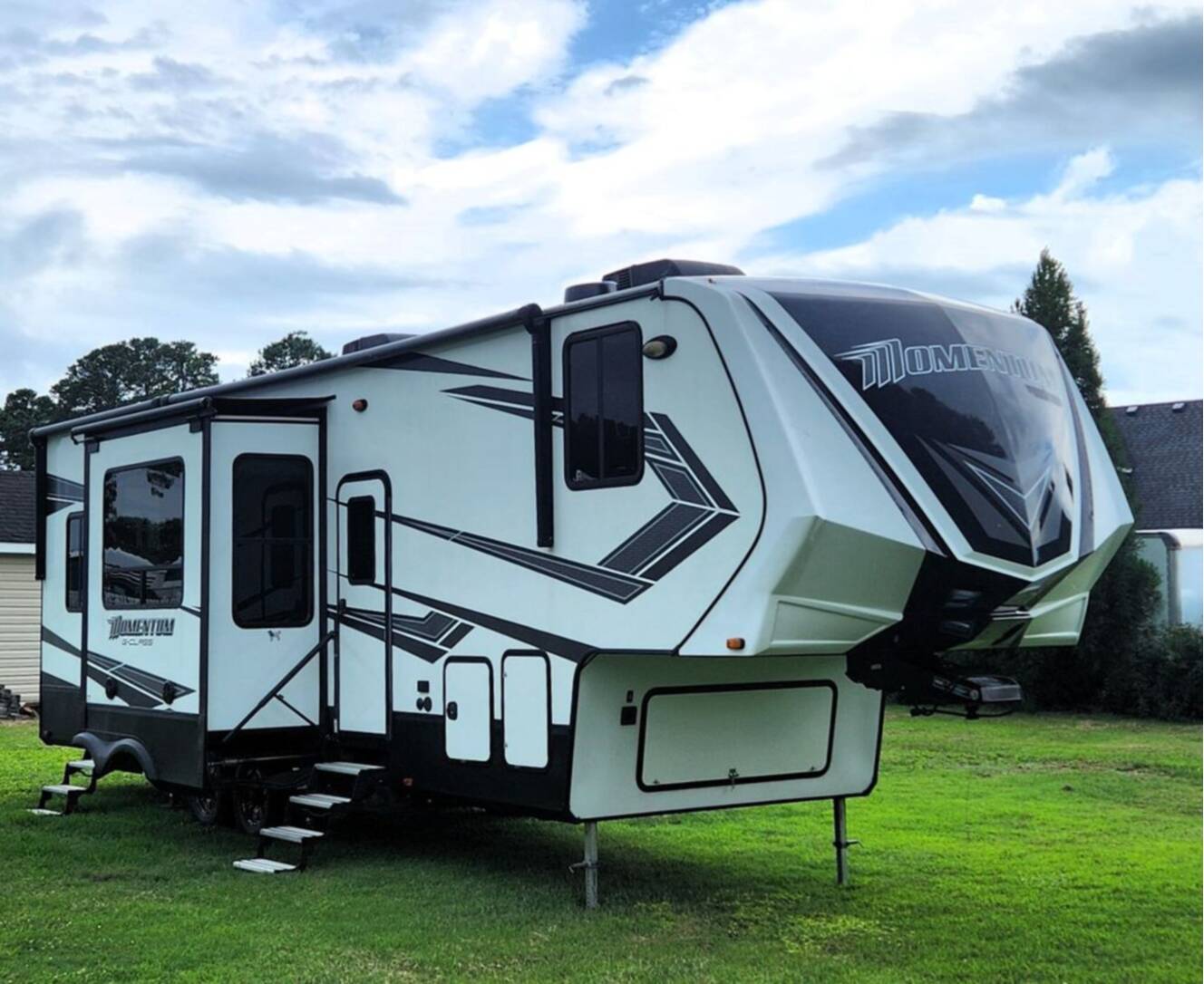 A photo of this 2020 Grand Design Momentum G Class 328G