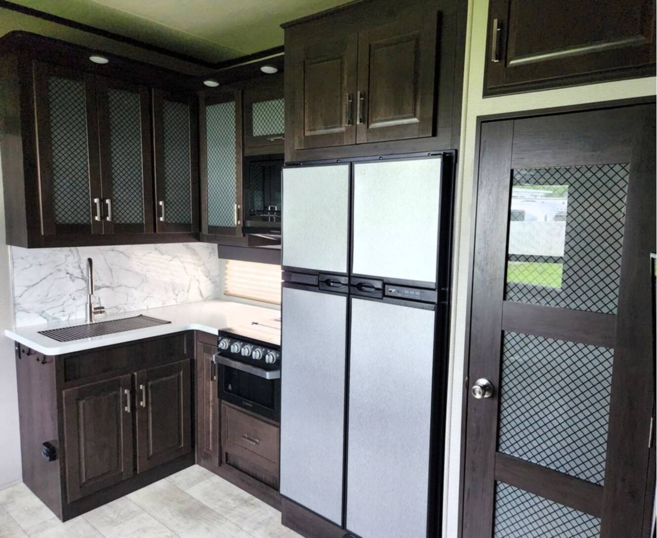 A photo of this 2020 Grand Design Momentum G Class 328G