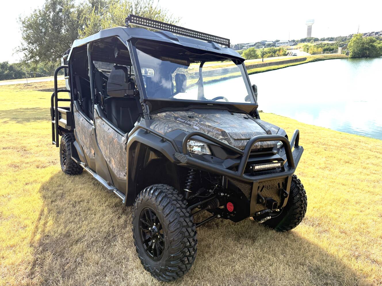 A photo of this 2023 Honda PIONEER 1000-6 CREW DELUXE
