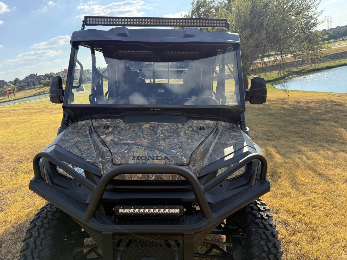 A photo of this 2023 Honda PIONEER 1000-6 CREW DELUXE