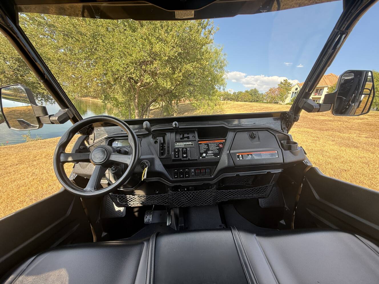 A photo of this 2023 Honda PIONEER 1000-6 CREW DELUXE