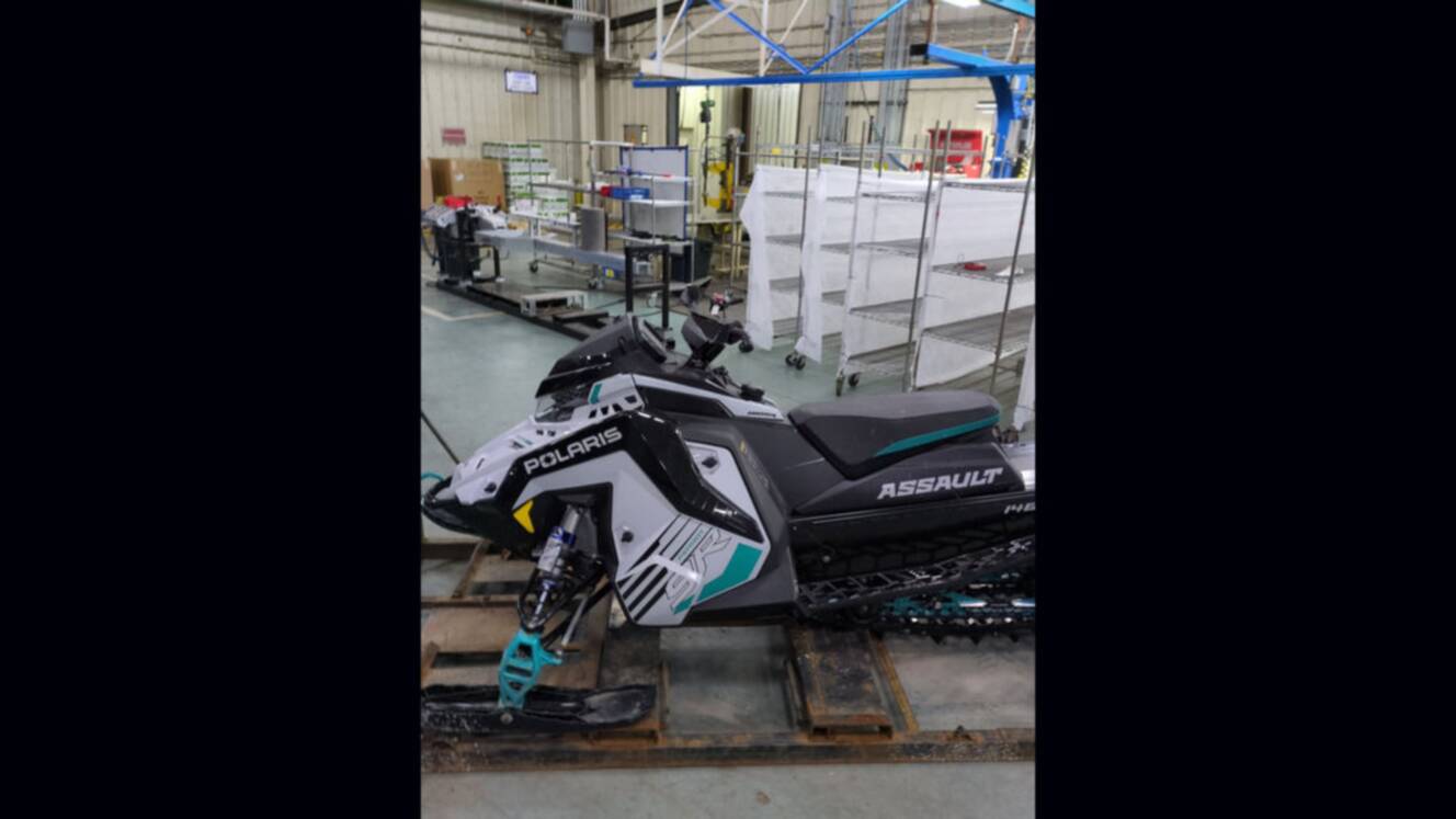 A photo of this 2025 Polaris® 9R Switchback Assault 146 Ghost White Metallic / Gloss 