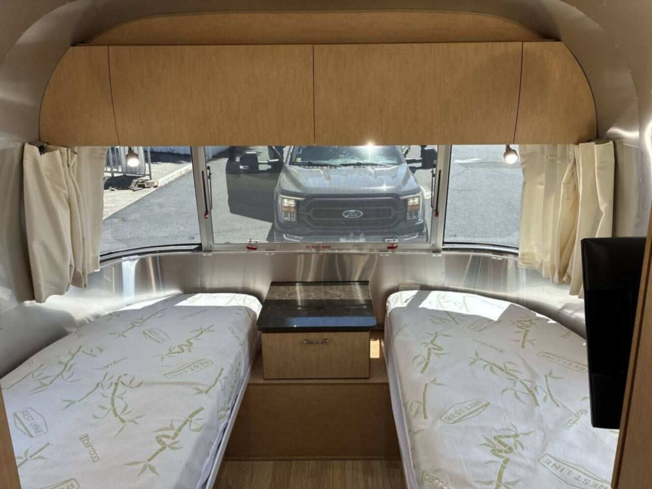 A photo of this 2016 Airstream Flying Cloud 28 Rear Bed Twin