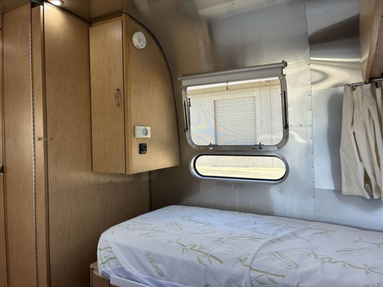 A photo of this 2016 Airstream Flying Cloud 28 Rear Bed Twin