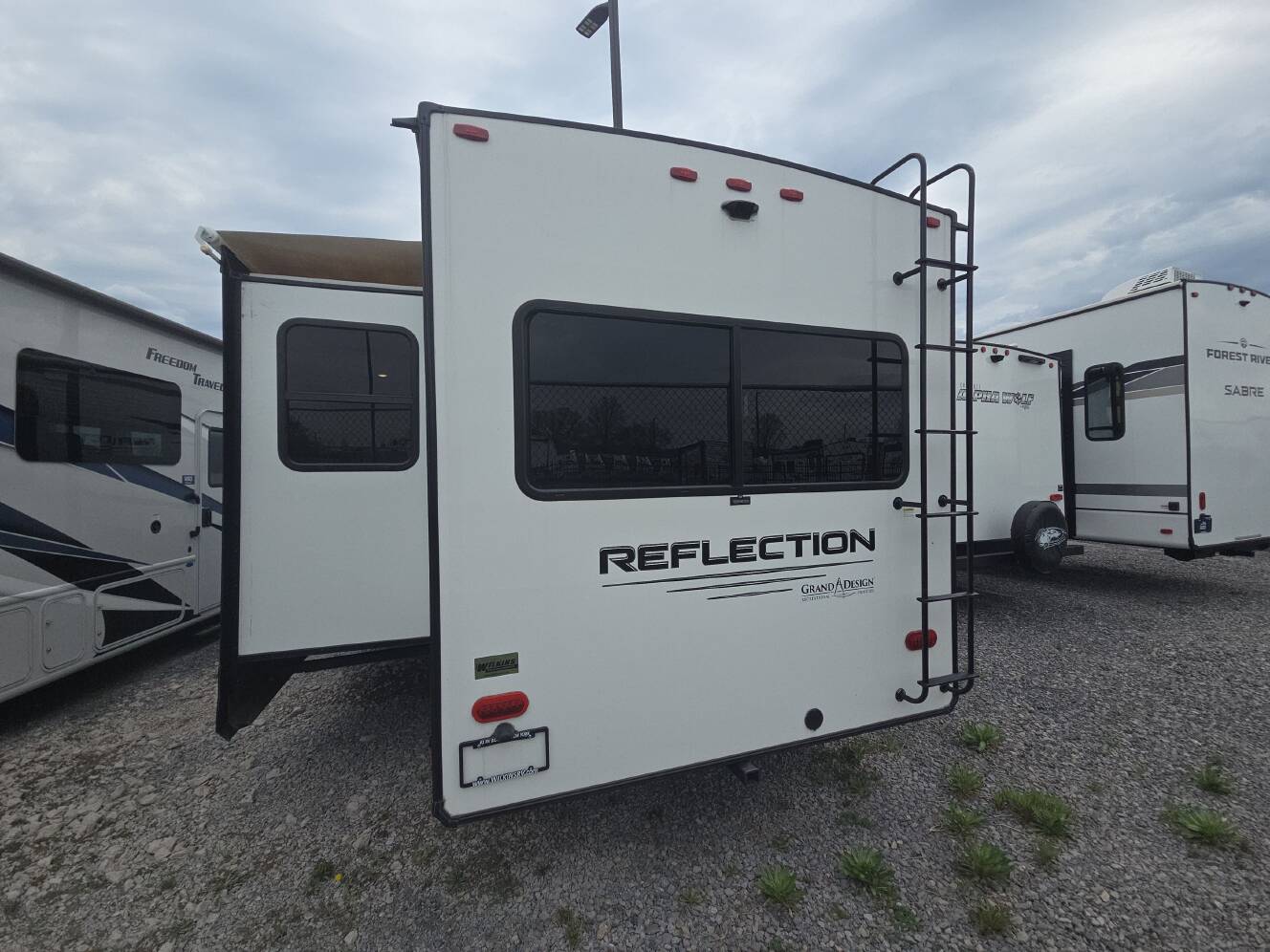 A photo of this 2022 Grand Design REFLECTION 297RSTS