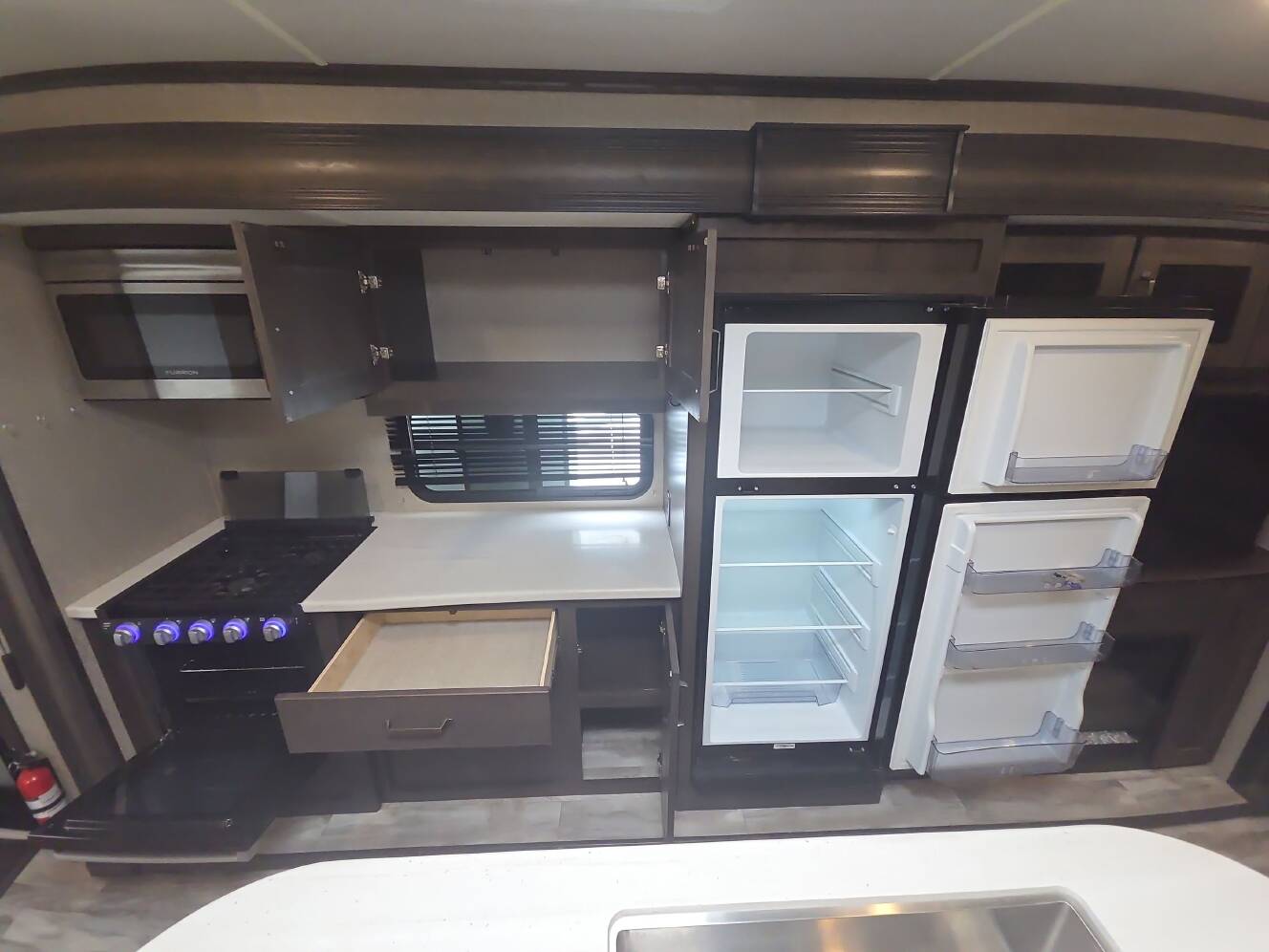 A photo of this 2022 Grand Design REFLECTION 297RSTS