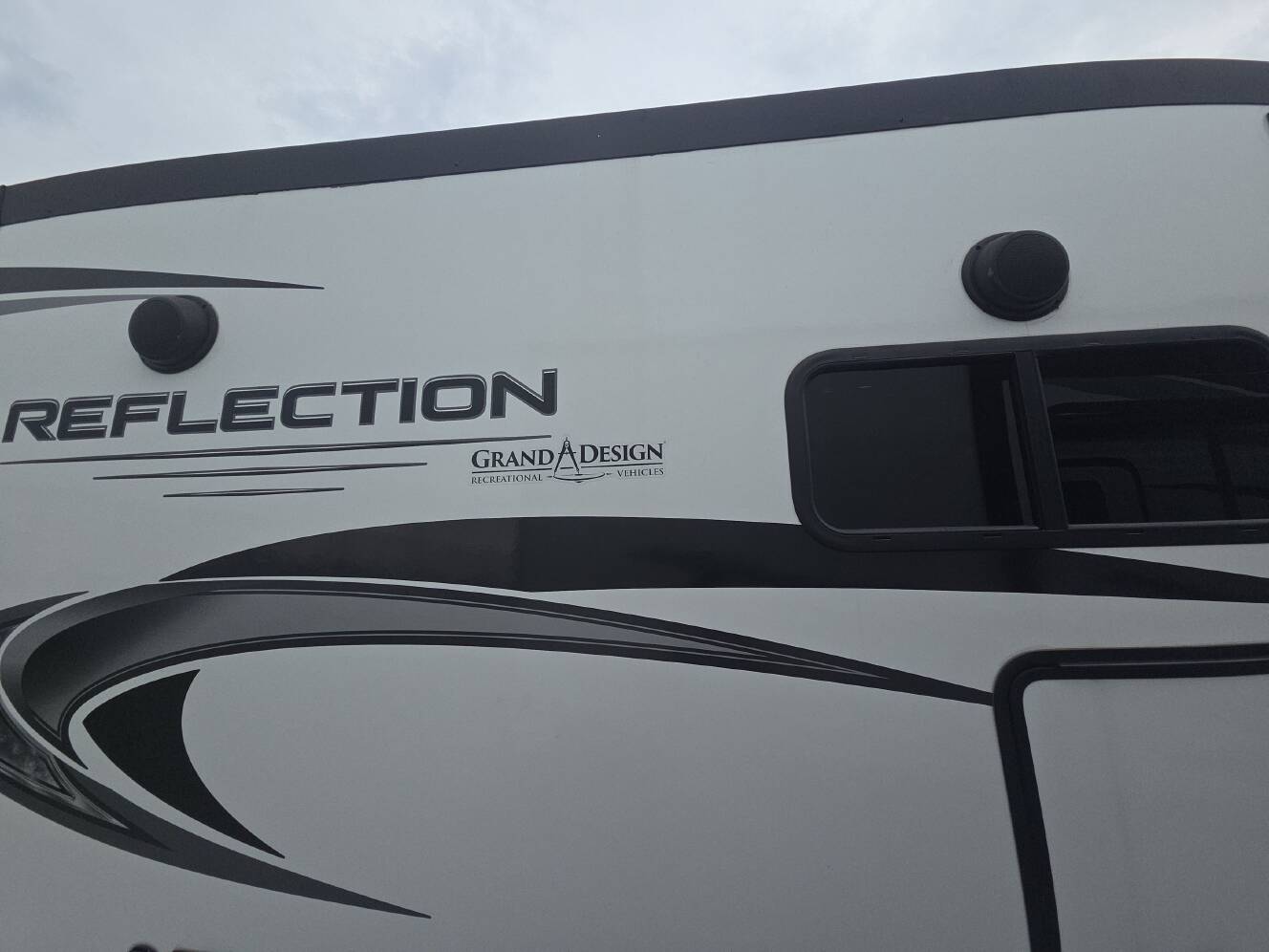 A photo of this 2022 Grand Design REFLECTION 297RSTS