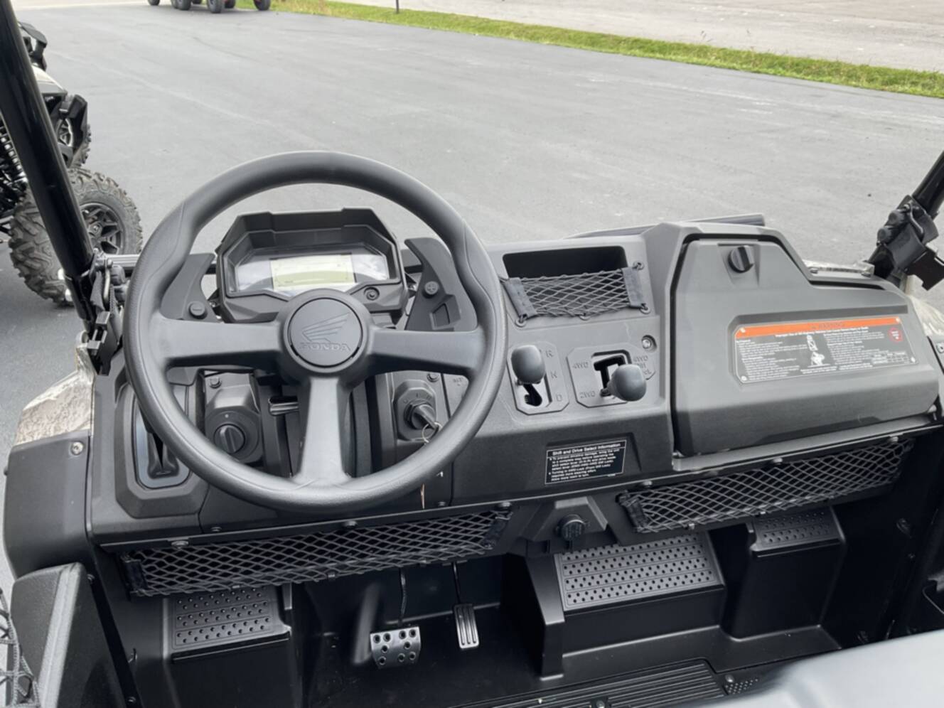 A photo of this 2026 Honda Pioneer 700 Forest