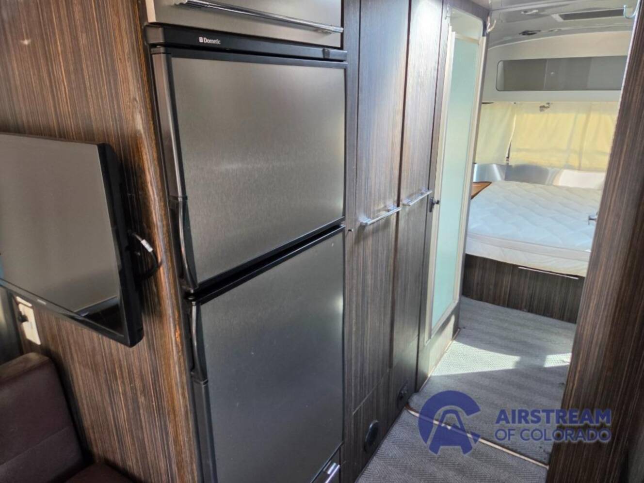 A photo of this 2016 Airstream International Signature 27FB Queen