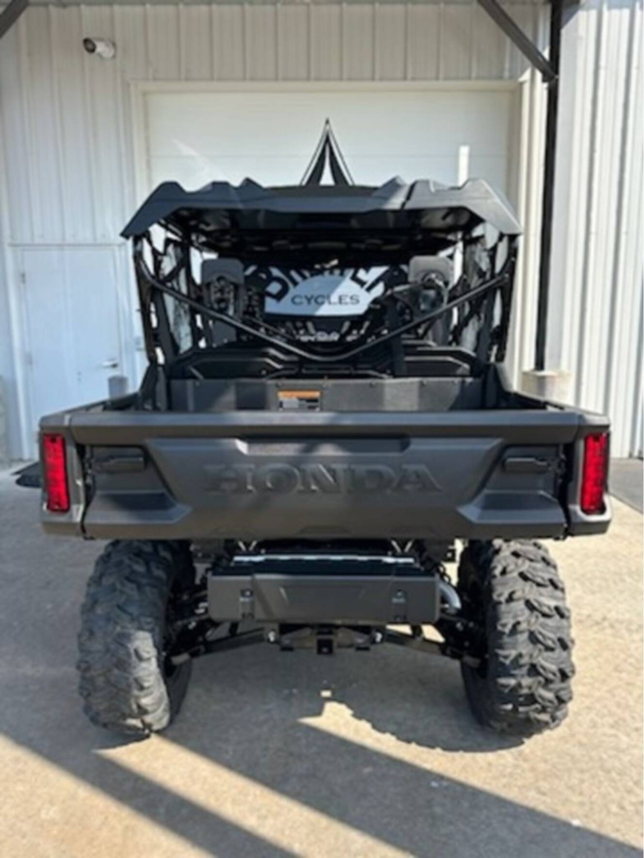 A photo of this 2025 Honda® Pioneer 1000-6 Deluxe Crew