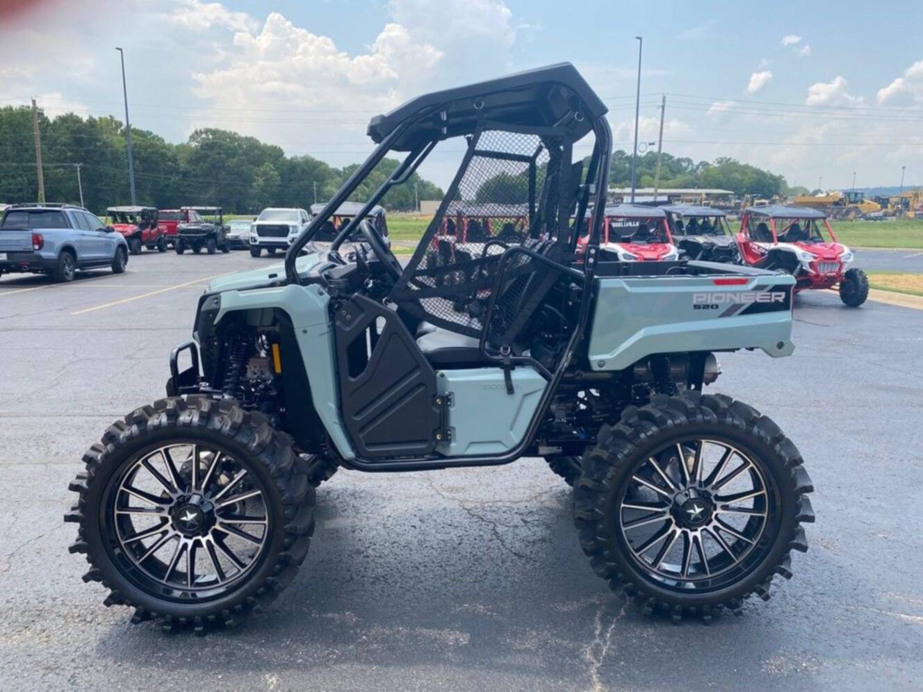 A photo of this 2026 Honda® Pioneer 520