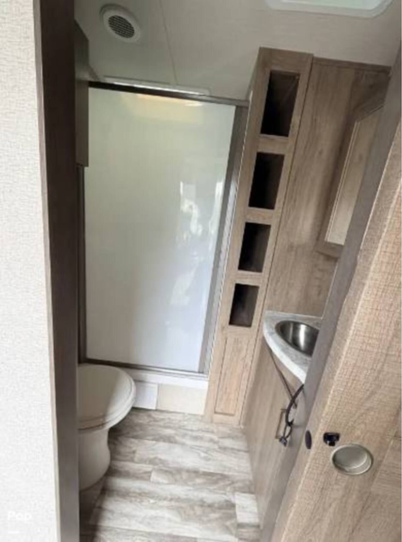 A photo of this 2022 Grand Design Imagine 2970RL