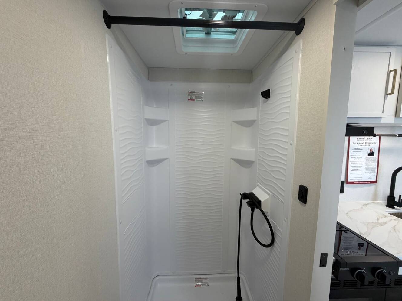 A photo of this 2027 Grand Design Transcend Lite 121RBL