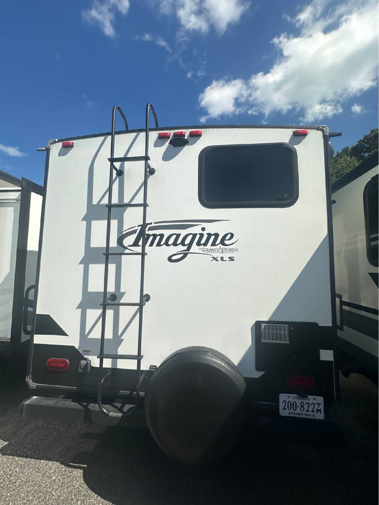 A photo of this 2022 Grand Design IMAGINE XLS 21BHE
