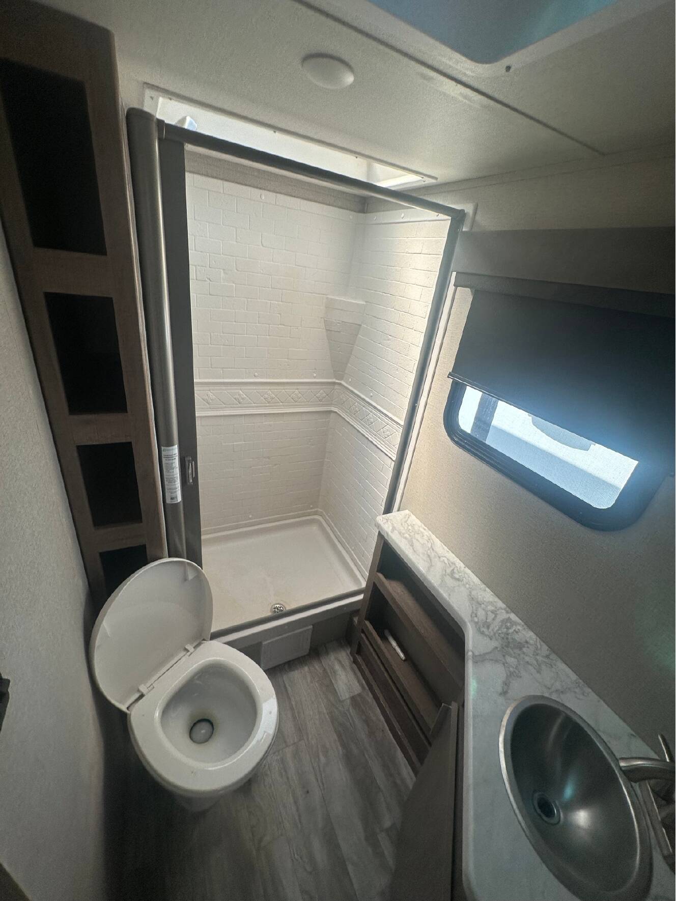 A photo of this 2022 Grand Design IMAGINE XLS 21BHE