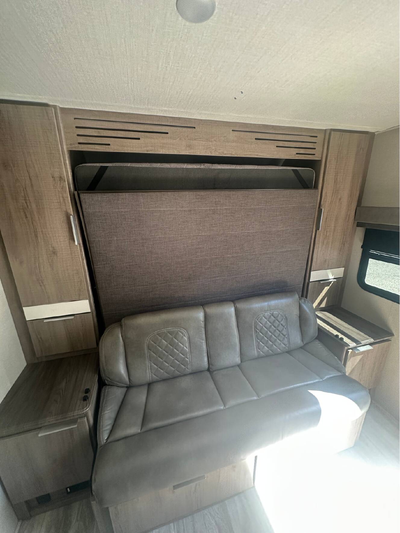 A photo of this 2022 Grand Design IMAGINE XLS 21BHE