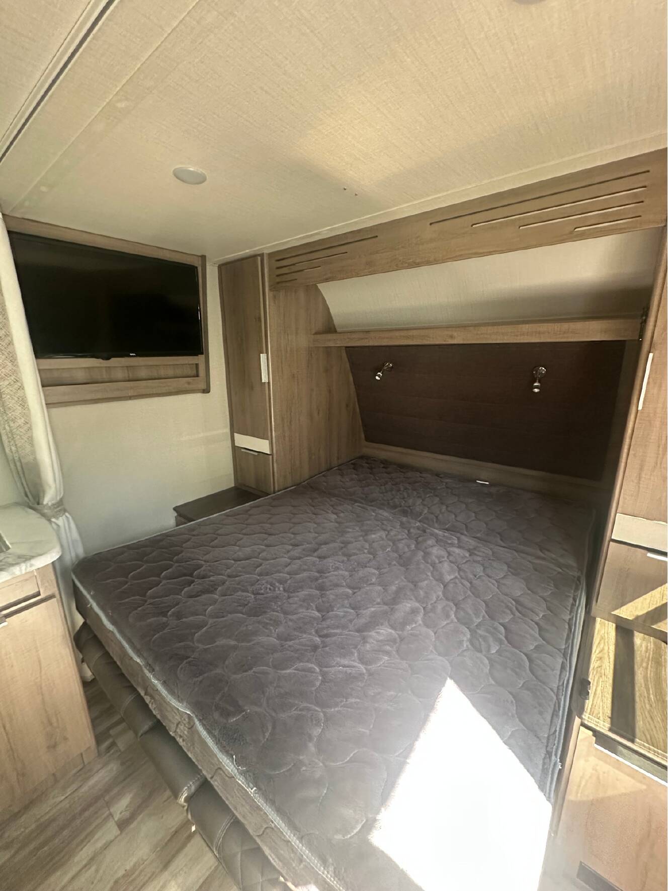 A photo of this 2022 Grand Design IMAGINE XLS 21BHE