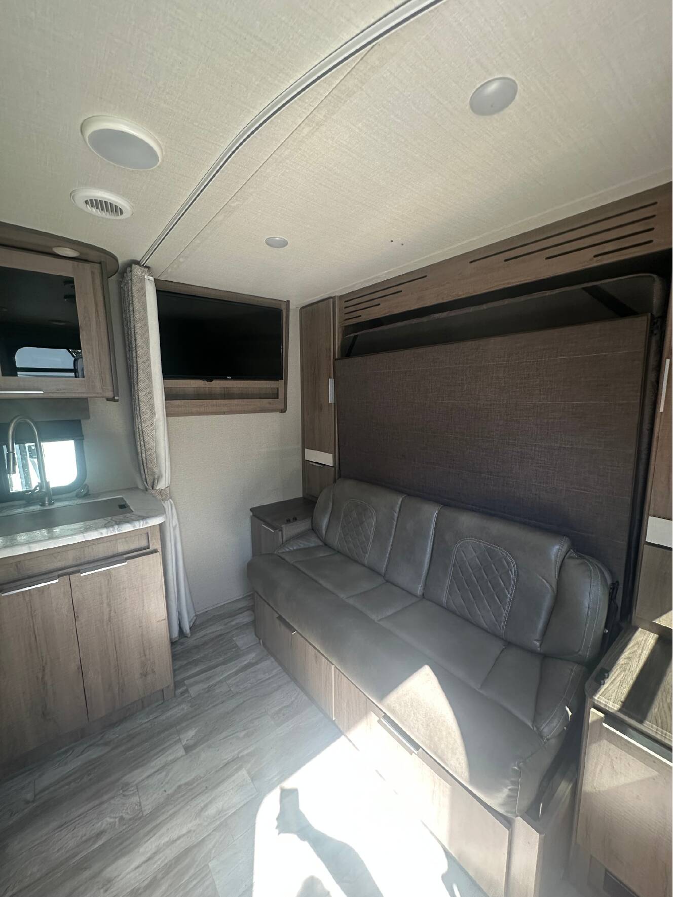 A photo of this 2022 Grand Design IMAGINE XLS 21BHE
