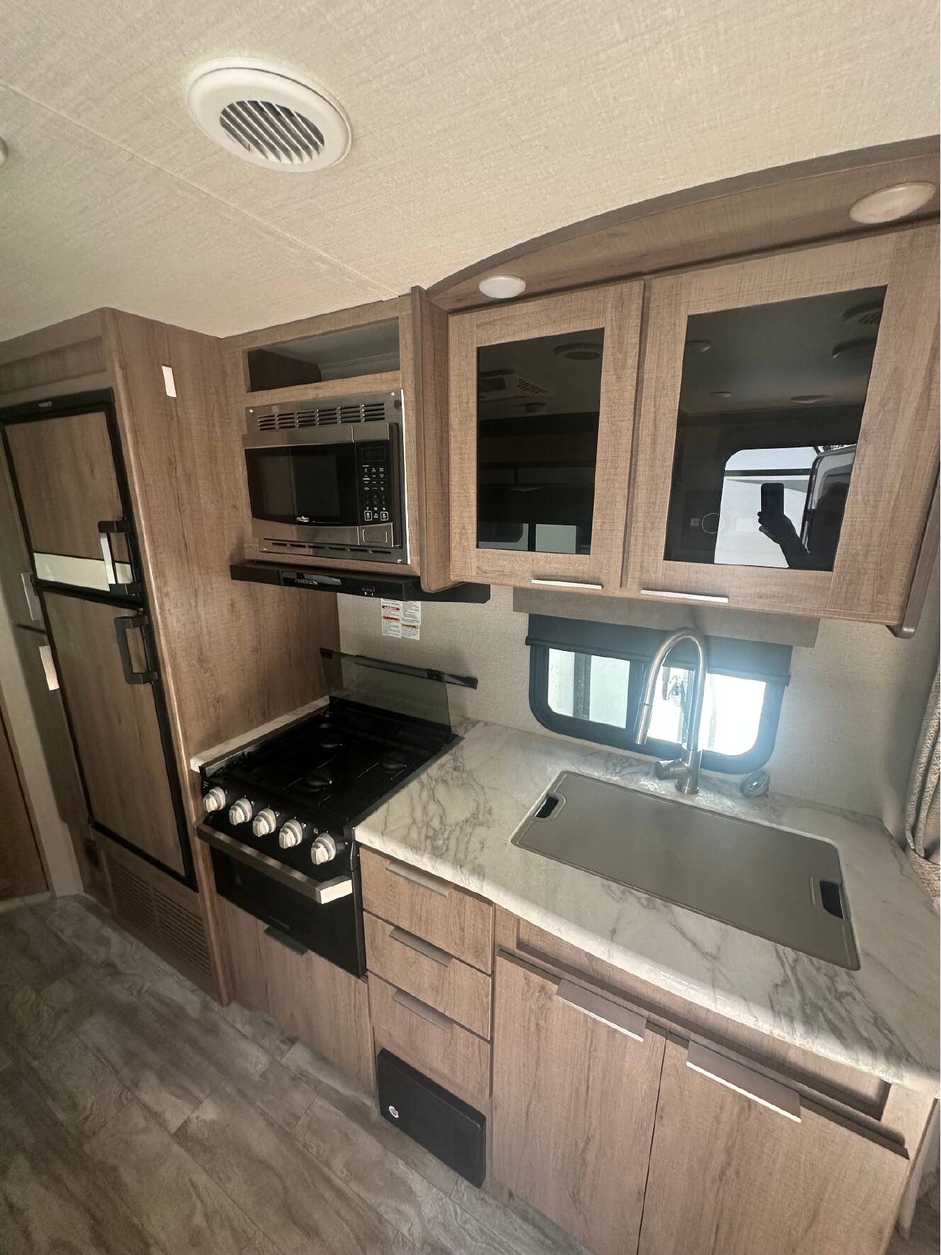 A photo of this 2022 Grand Design IMAGINE XLS 21BHE
