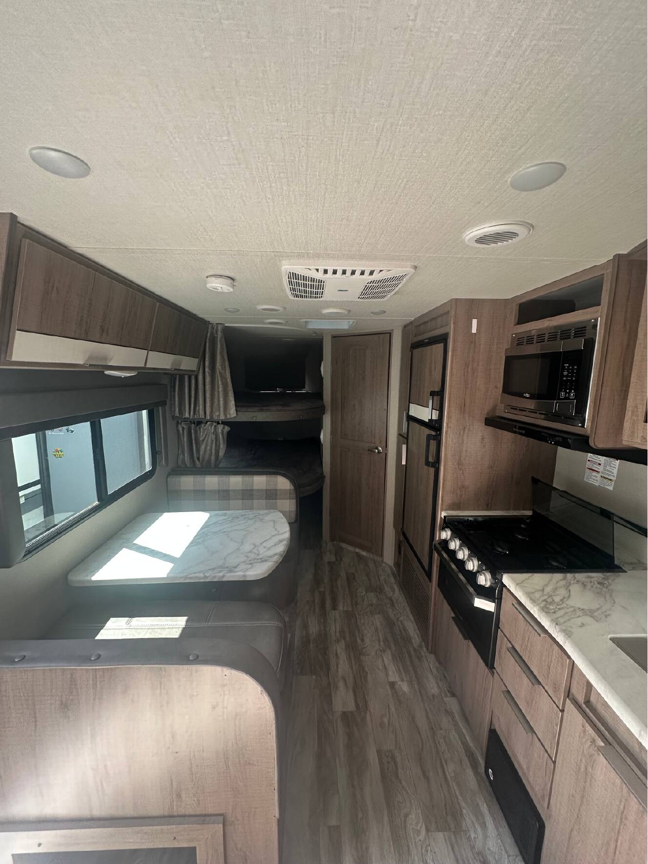 A photo of this 2022 Grand Design IMAGINE XLS 21BHE
