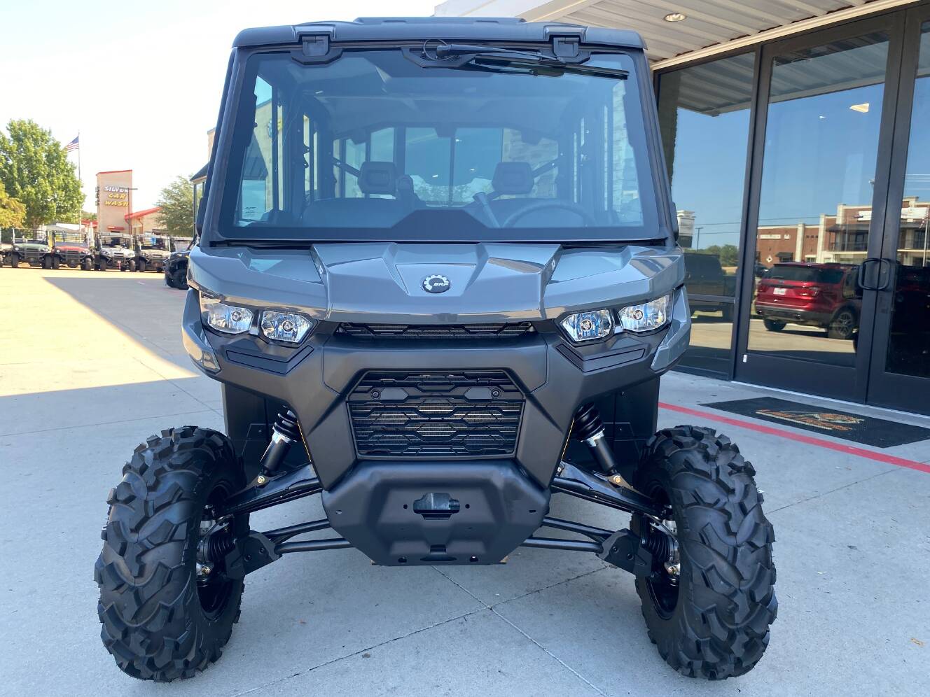 A photo of this 2027 Can-Am Defender MAX DPS CAB HD10 Dolomite Grey